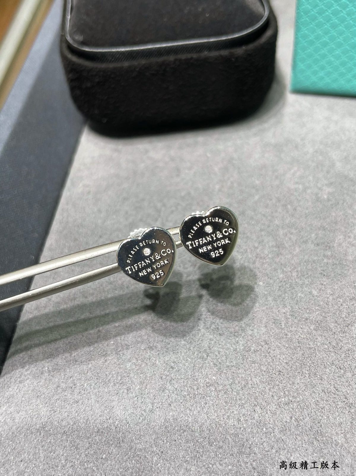 Silver heart-shaped diamond earrings