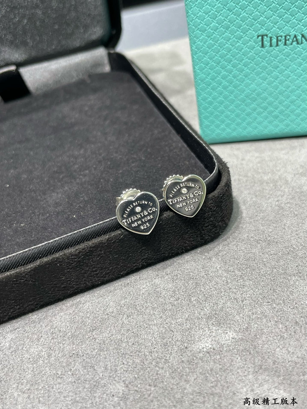 Silver heart-shaped diamond earrings