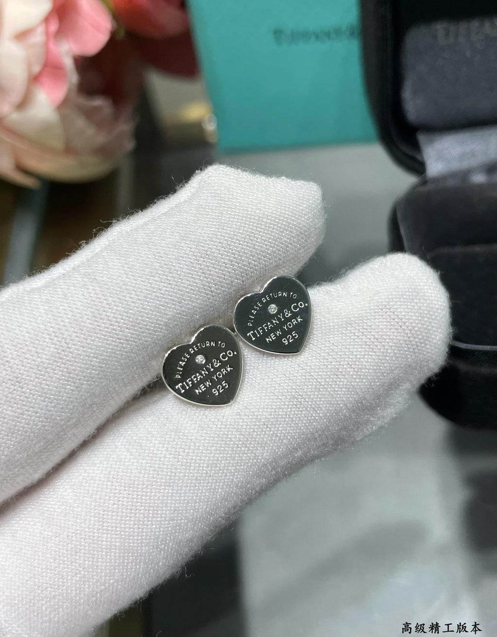 Silver heart-shaped diamond earrings
