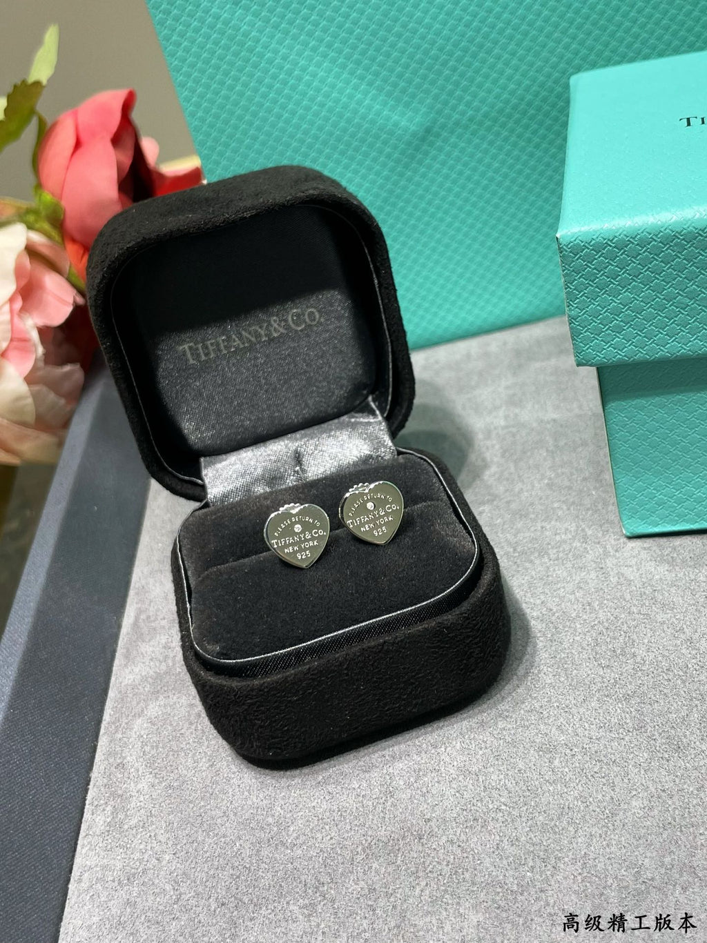 Silver heart-shaped diamond earrings