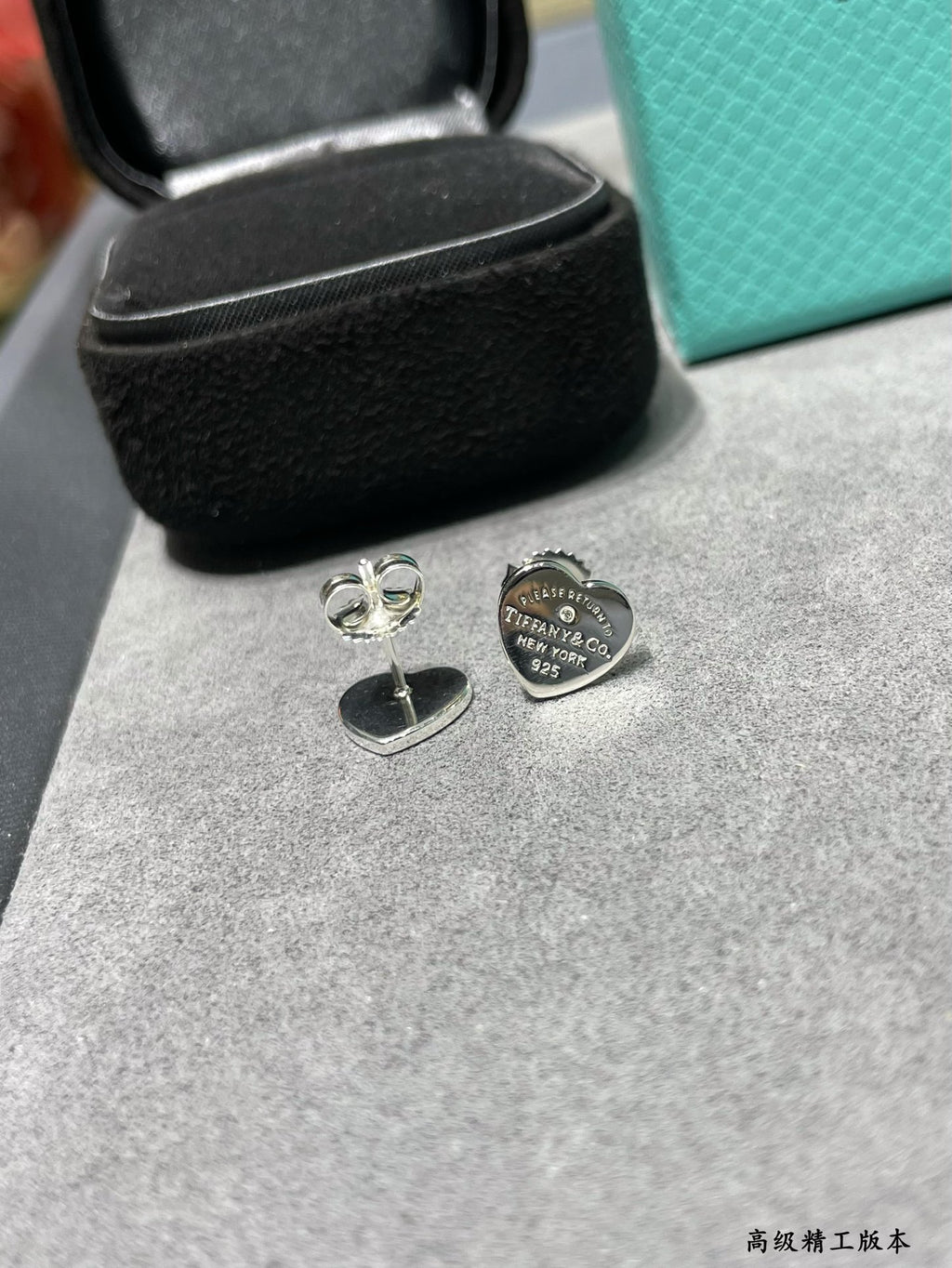 Silver heart-shaped diamond earrings
