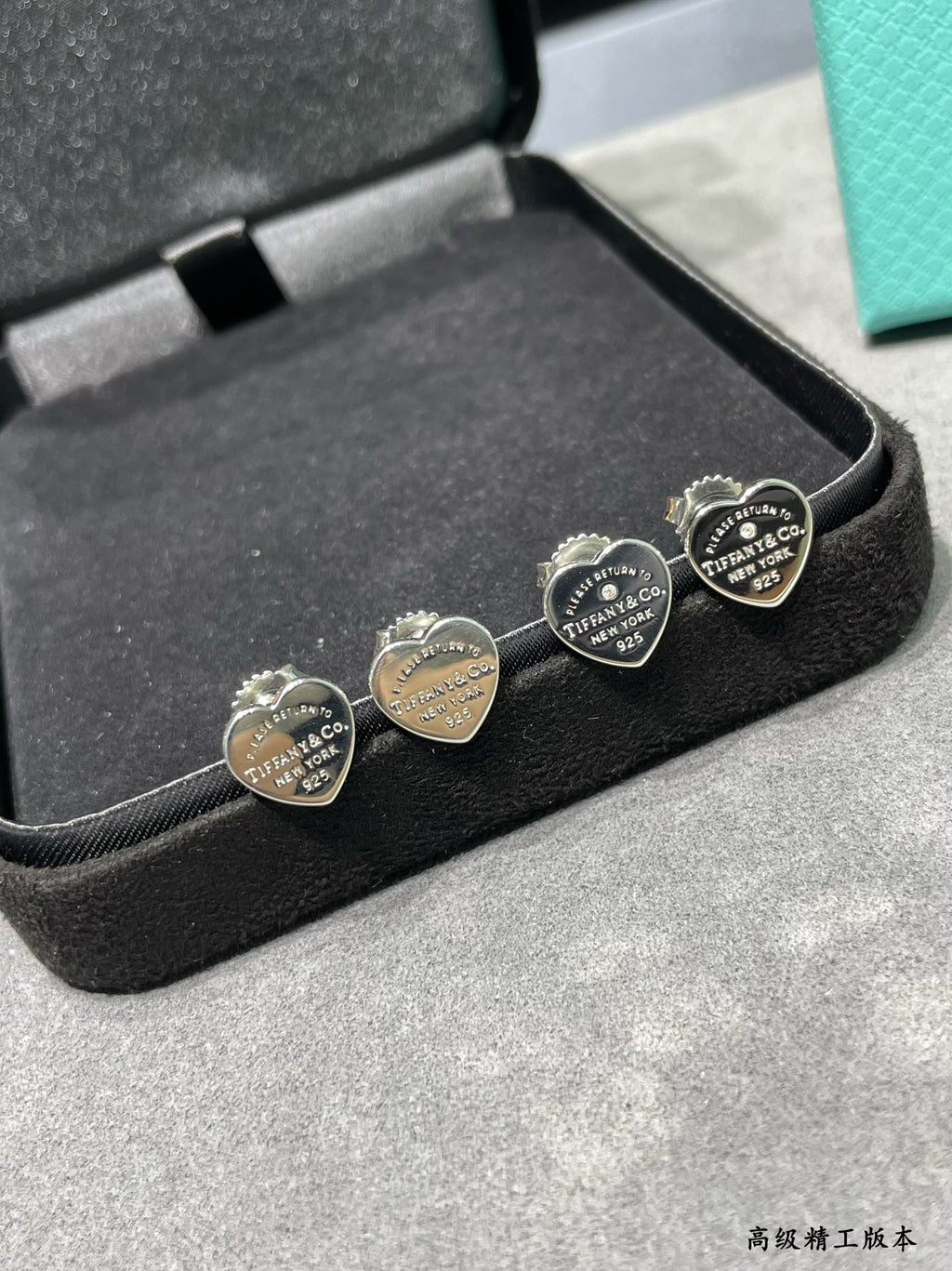 Silver heart-shaped diamond earrings