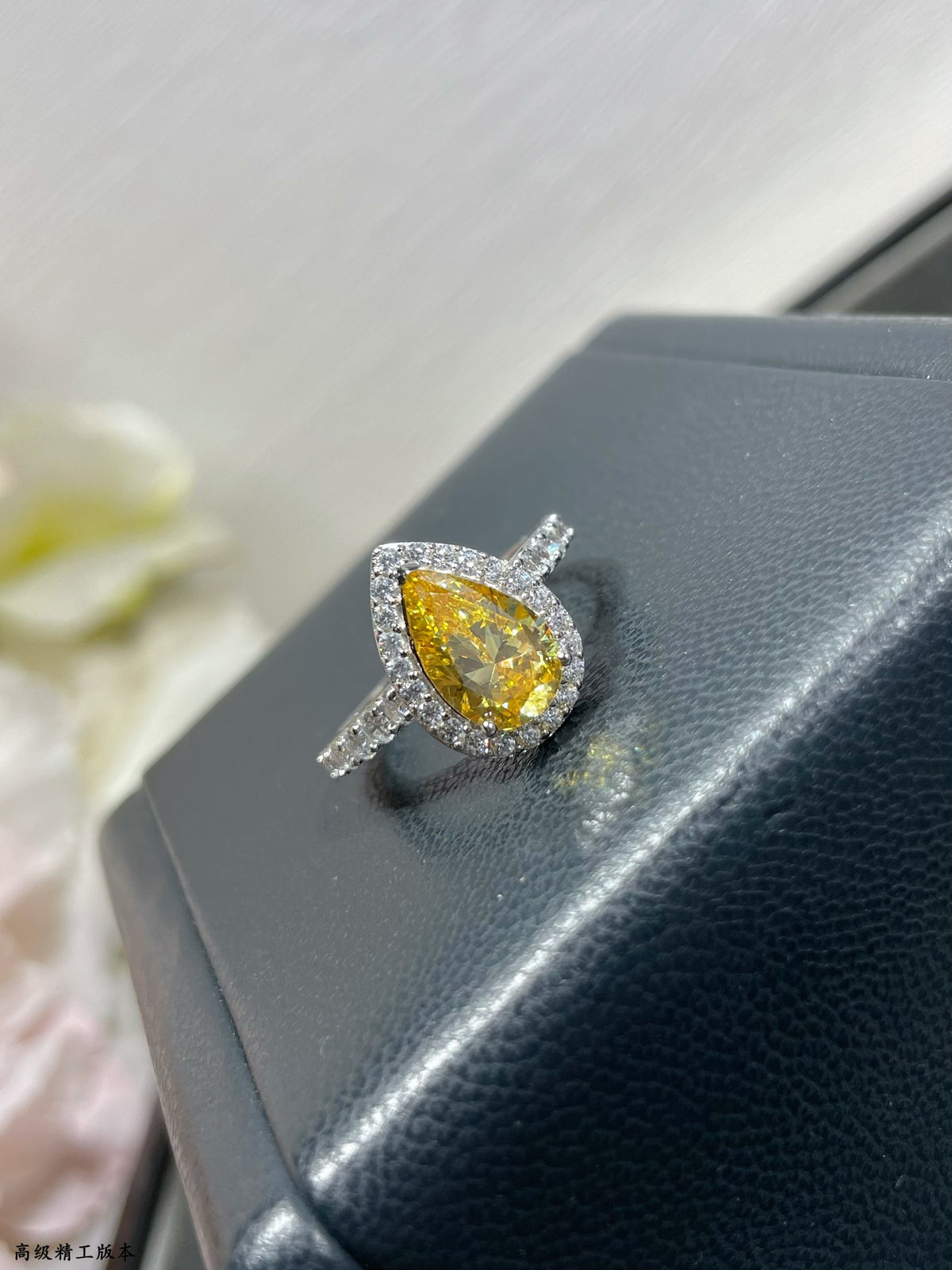 teardrop-shaped yellow diamond ring