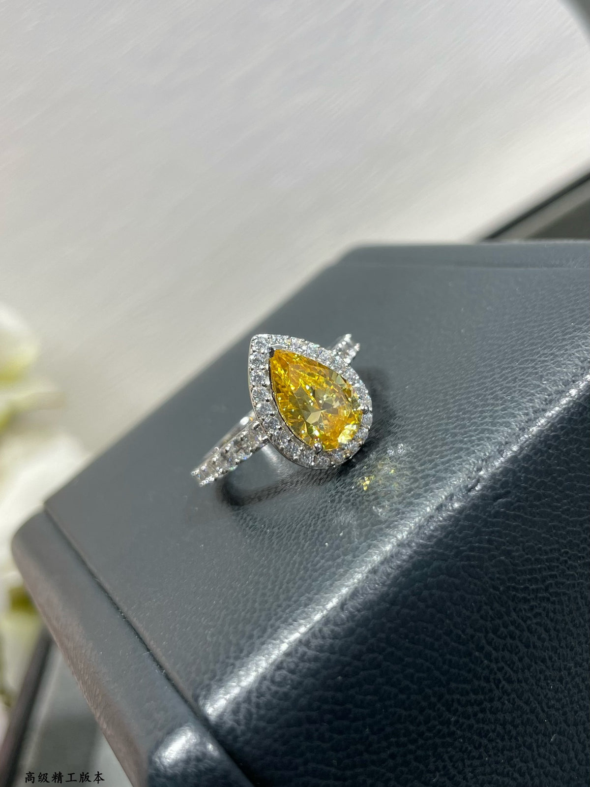 teardrop-shaped yellow diamond ring