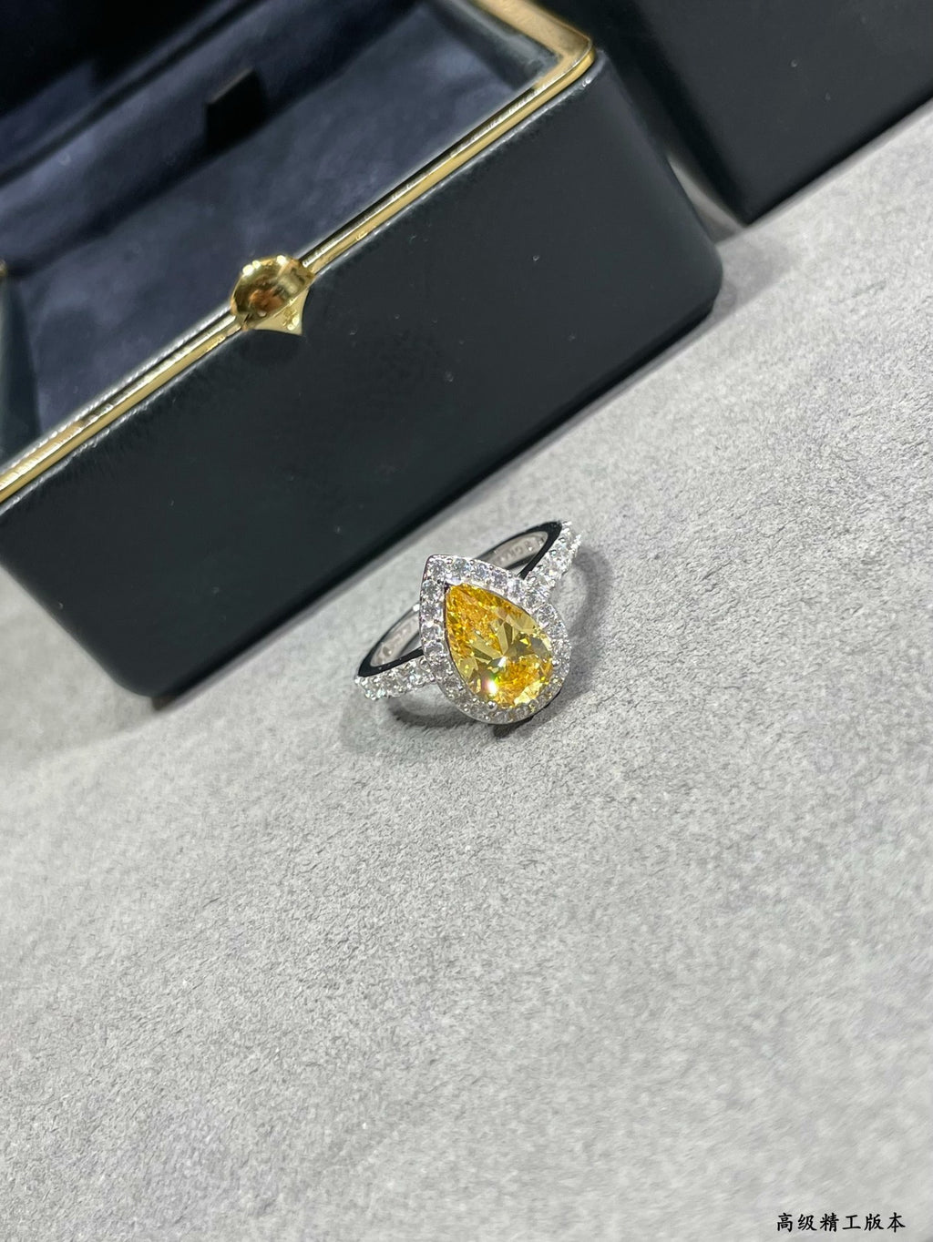 teardrop-shaped yellow diamond ring