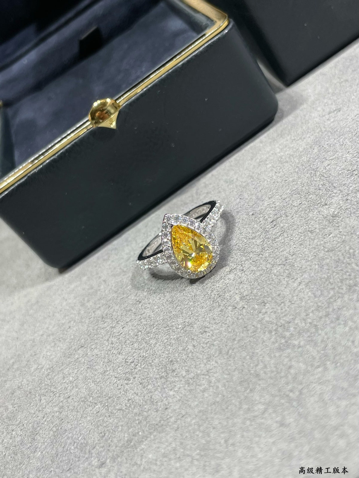 teardrop-shaped yellow diamond ring