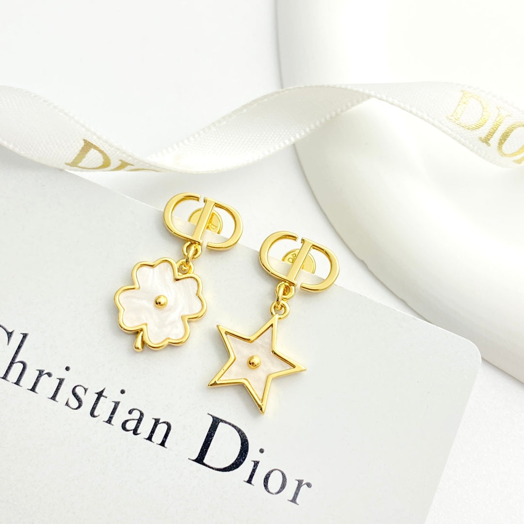 Earrings: White mother-of-pearl + metal embellishment