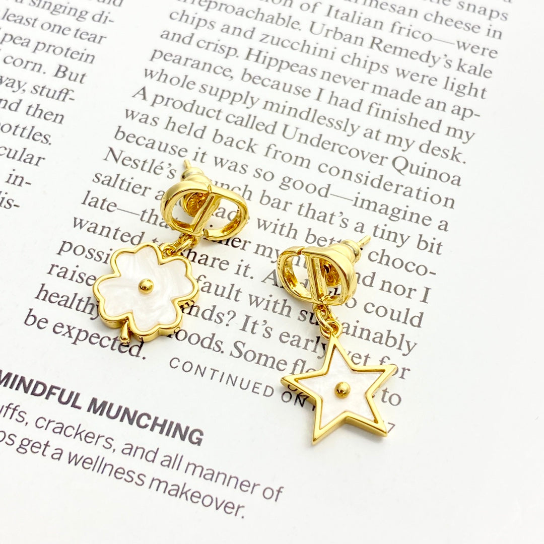 Earrings: White mother-of-pearl + metal embellishment