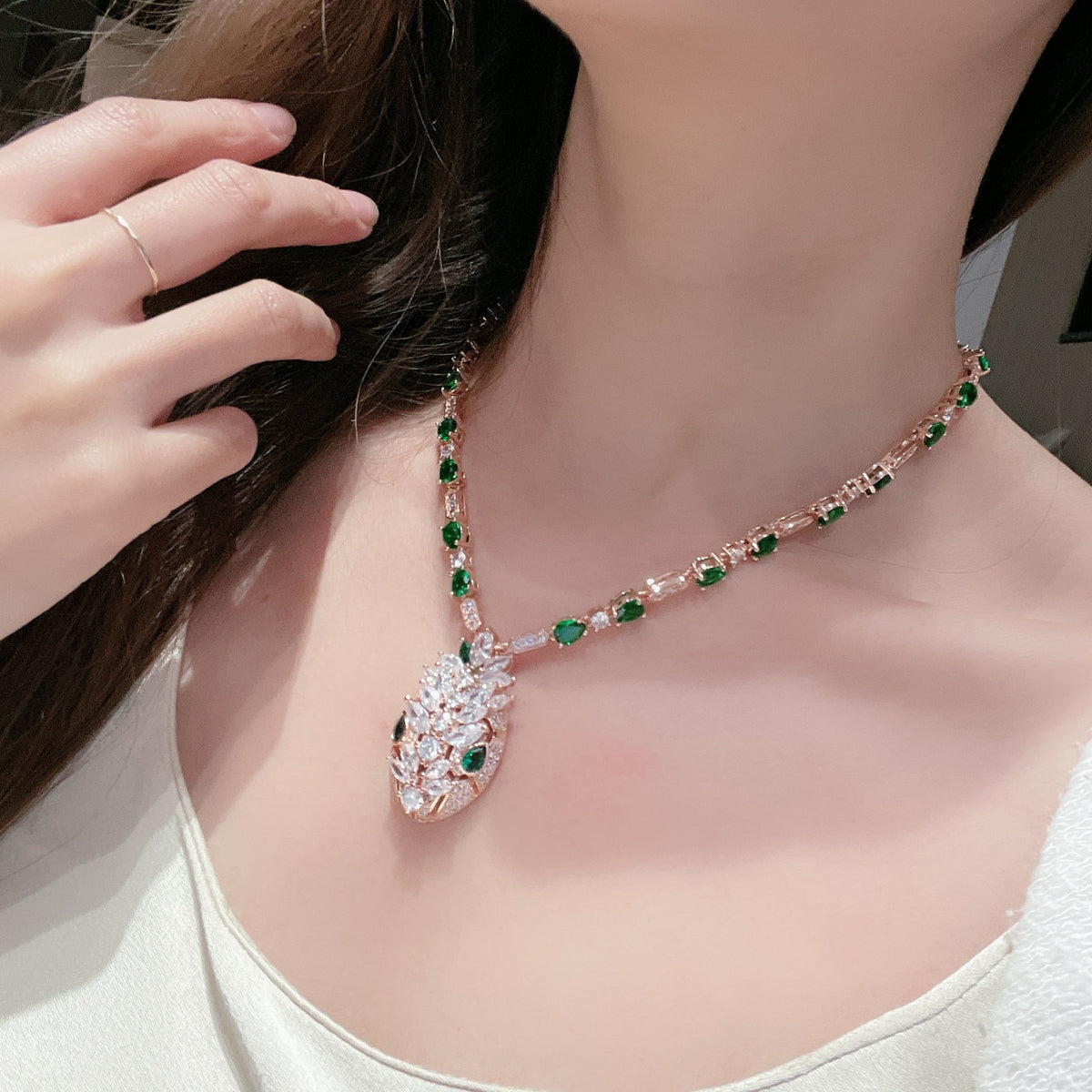 Green eye necklace
